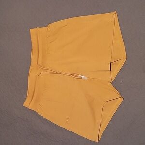 ZYIA Women's Athletic Shorts in Mustard Yellow